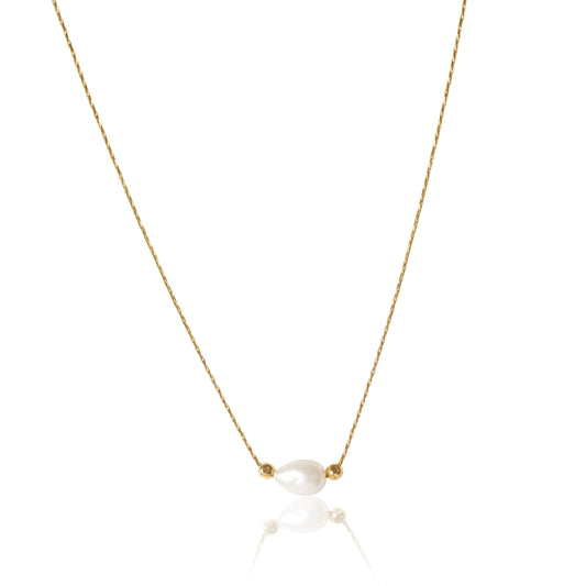 Gold necklace with a pearl pendant on a white background